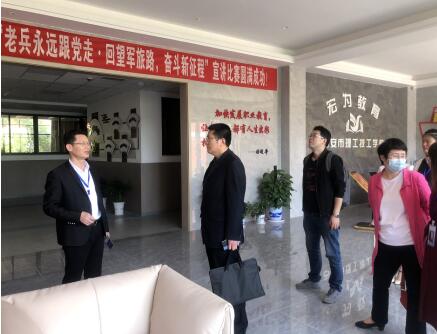 吉安理工技工學校接待江西中醫藥大學繼續教育學院副院長萬崇毅一行